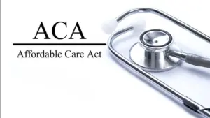 Page with ACA (Affordable Care Act) on the table with stethoscope^ medical concept