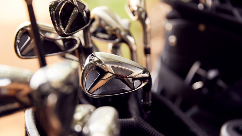 close-up-of-clubs-in-bag-on-golf-buggy