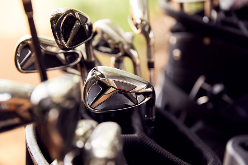 close-up-of-clubs-in-bag-on-golf-buggy