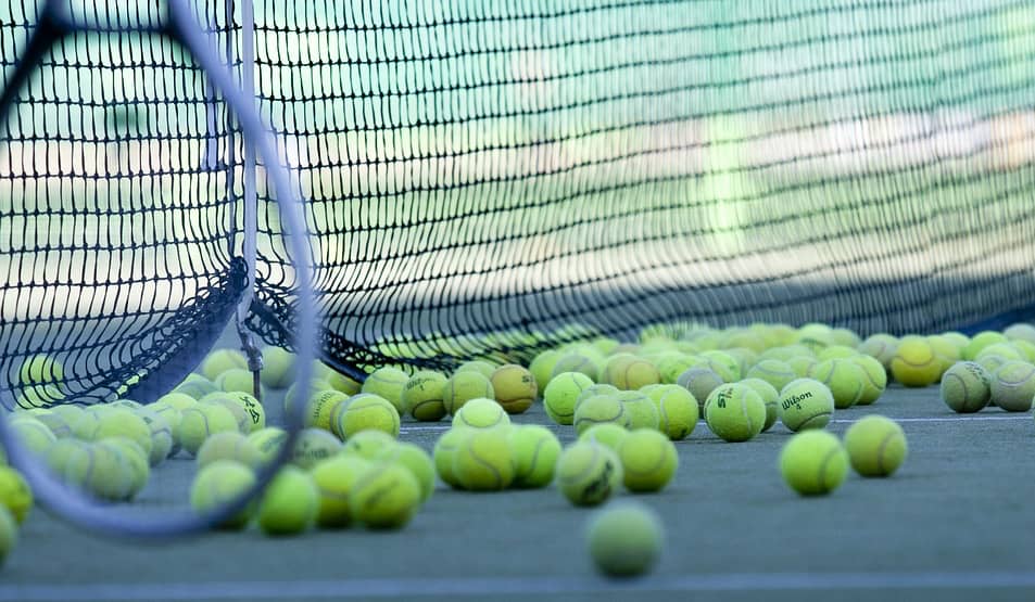 tennis-balls-and-net