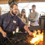 blacksmith-sam-hibbs-entertains-visitors-to-the-ozark-folk-center-craft-village-in-mountain-view-150x150-1