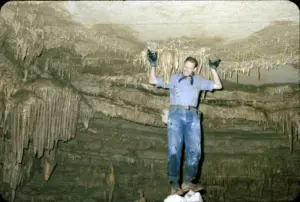 3-hugh-shell-poses-beneath-stalactites-inside-an-arkansas-cave