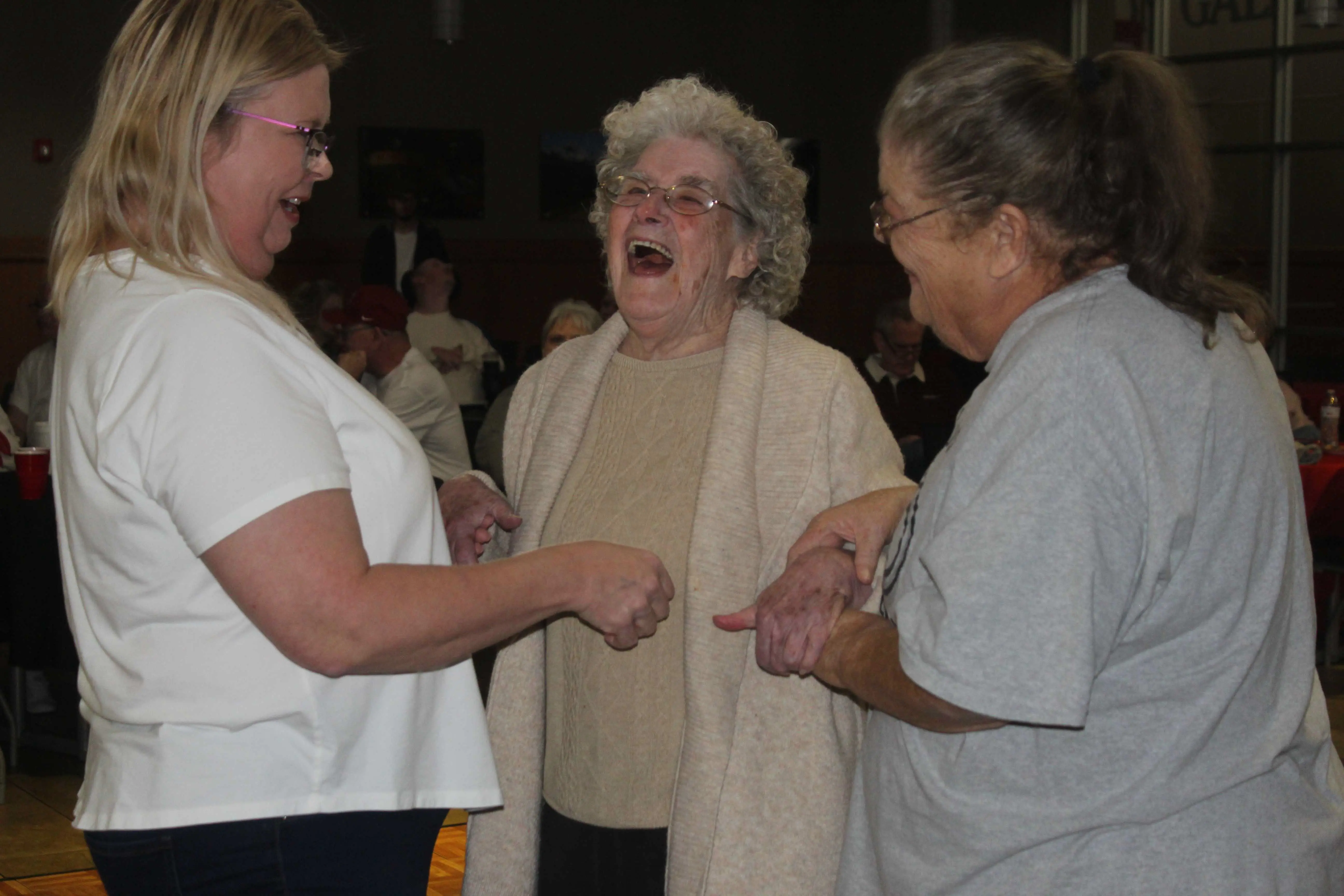 laverne-hurd-in-center-with-direct-care-supervisor-tina-equitz-and-direct-support-professional-priscilla-davidson