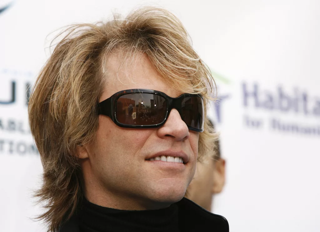 musician-jon-bon-jovi-smiles-before-speaking-at-a-habitat-for-humanity-building-site-in-brooklyn-new-york-3