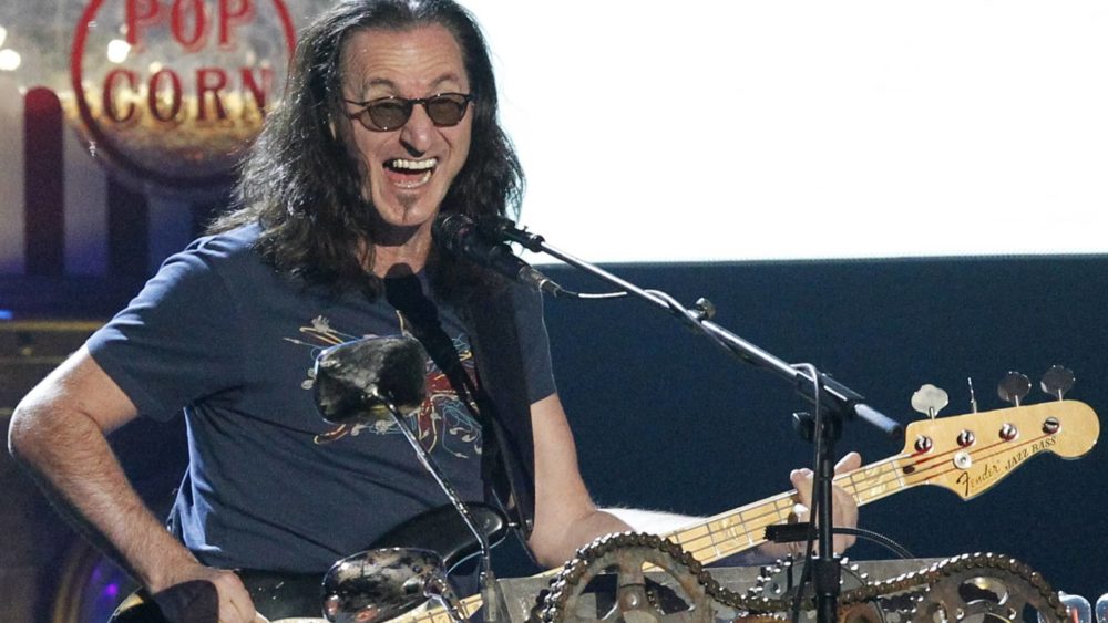 geddy-lee-of-rush-performs-during-his-bands-induction-at-the-2013-rock-and-roll-hall-of-fame-induction-ceremony-in-los-angeles-6