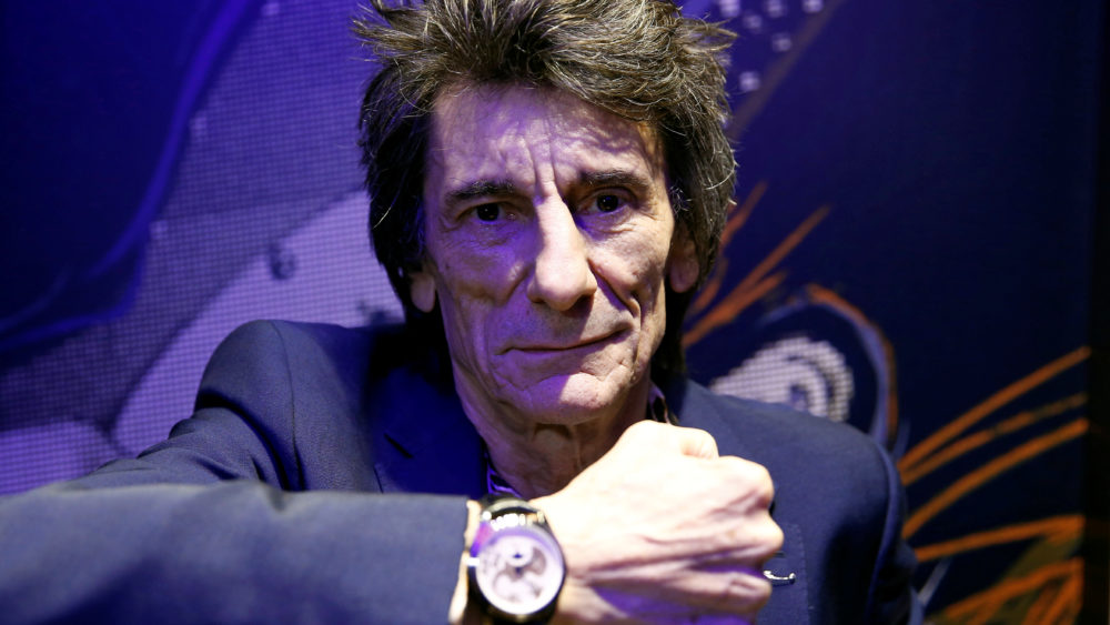 ronnie-wood-of-the-rolling-stones-poses-with-one-of-the-47-limited-edition-watches-he-designed-in-collaboration-with-bremont-during-a-launch-event-at-a-watch-shop-in-london