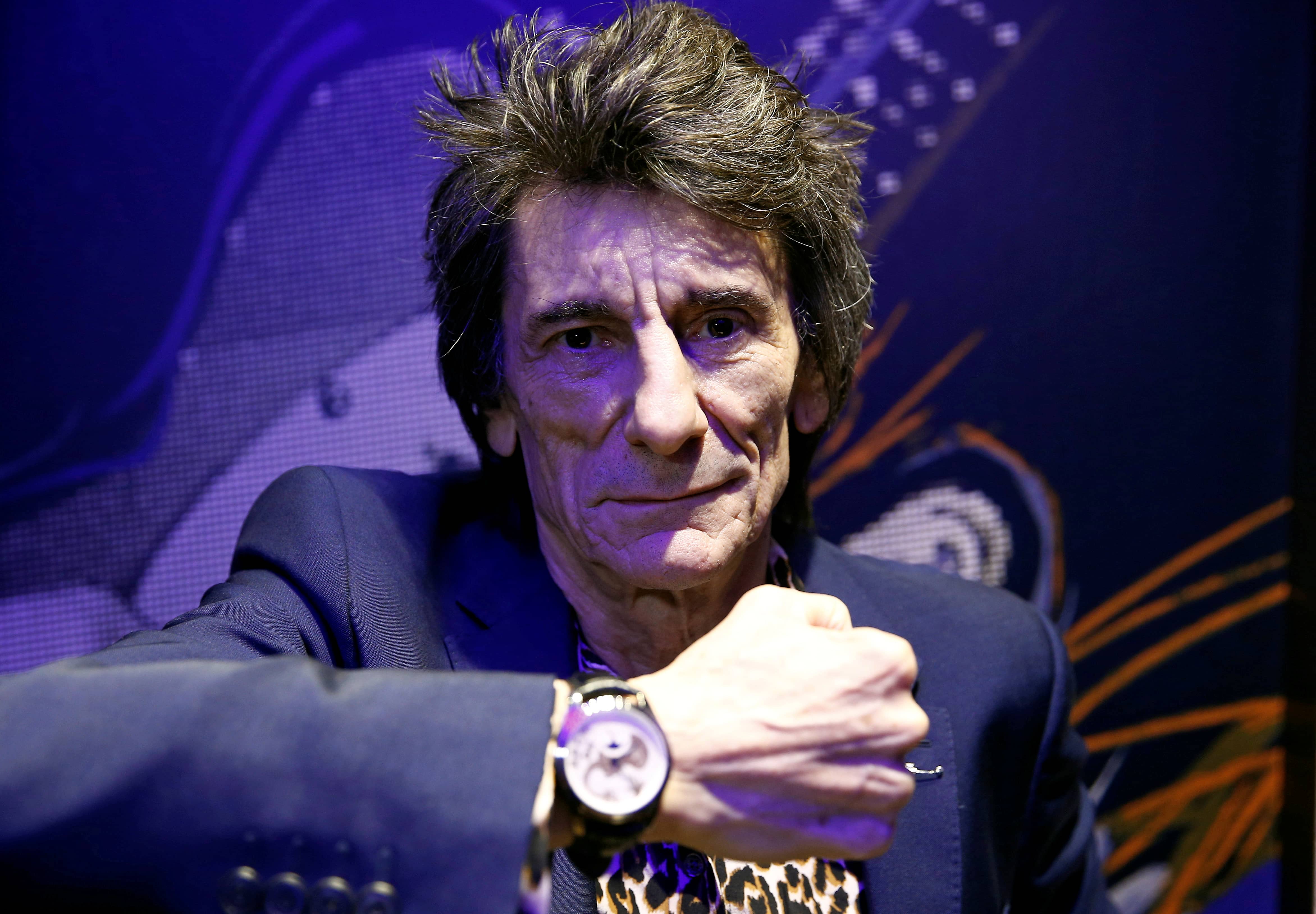 ronnie-wood-of-the-rolling-stones-poses-with-one-of-the-47-limited-edition-watches-he-designed-in-collaboration-with-bremont-during-a-launch-event-at-a-watch-shop-in-london