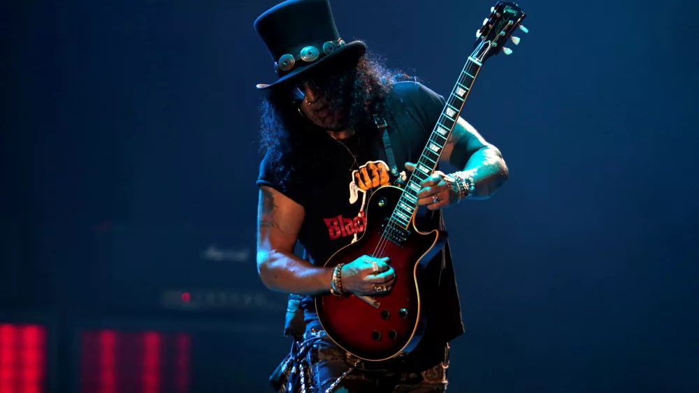 slash-lead-guitarist-of-u-s-rock-band-guns-n-roses-performs-during-their-not-in-this-lifetime-tour-at-the-du-arena-in-abu-dhabi-11