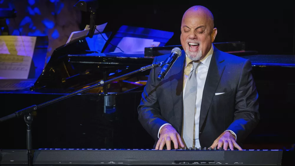 billy-joel-performs-after-accepting-an-award-at-the-american-society-of-composers-authors-and-publishers-centennial-awards-in-new-york-9