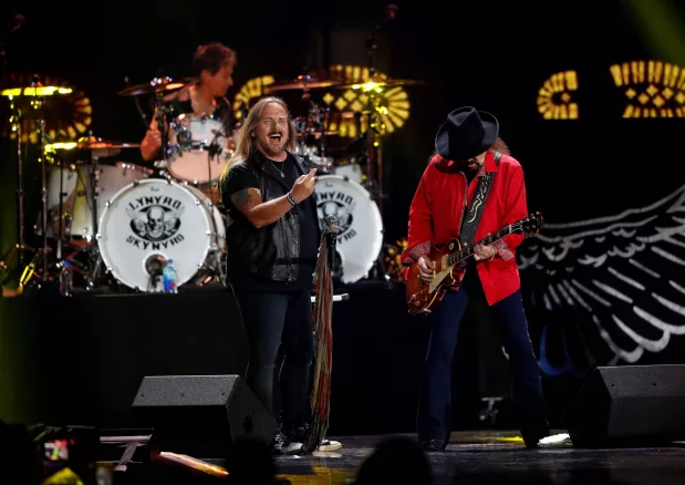 lynyrd-skynyrd-lead-vocalist-johnny-van-zant-and-gary-rossington-perform-during-the-iheartradio-music-festival-at-t-mobile-arena-in-las-vegas-11