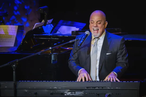 billy-joel-performs-after-accepting-an-award-at-the-american-society-of-composers-authors-and-publishers-centennial-awards-in-new-york-10