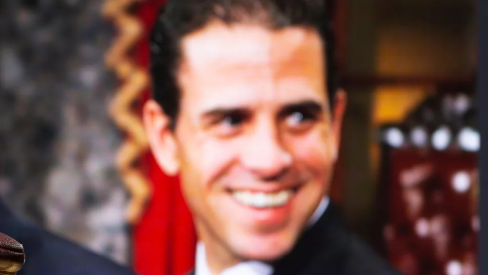 Hunter Biden^ court session. A court hammer on the background of a photo.