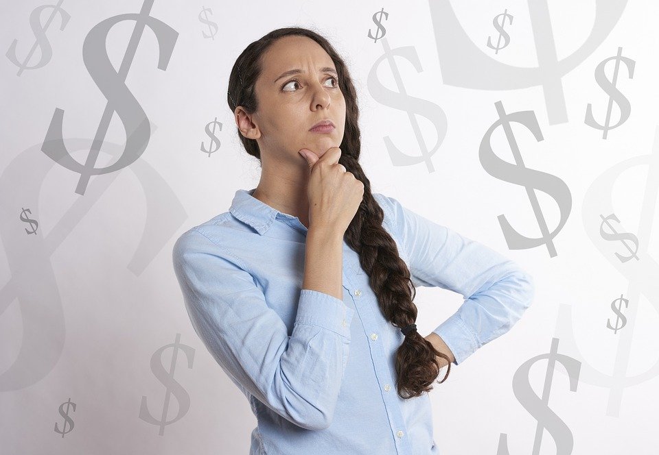 debt-money-paycheck-thinking-woman-salary-credit