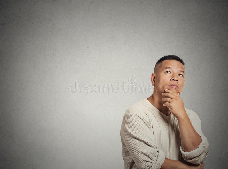 middle-aged-man-thinking-looking-up-portrait-headshot-handsome-isolated-grey-wall-background-copy-space-human-face-48717475