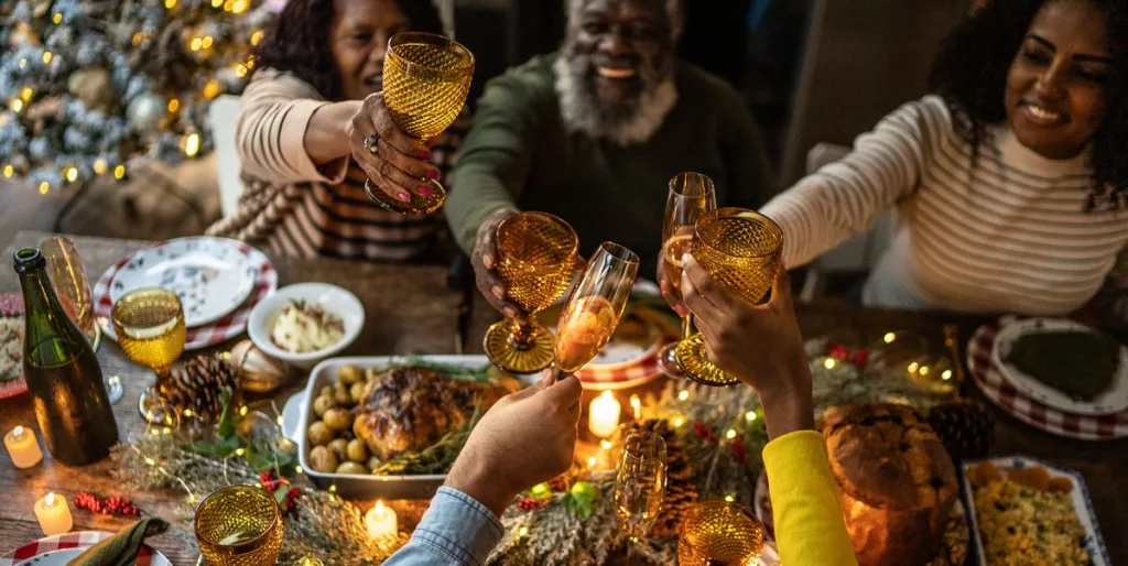 family-toasting-on-christmas-dinner-at-home-royalty-free-image-1699896250