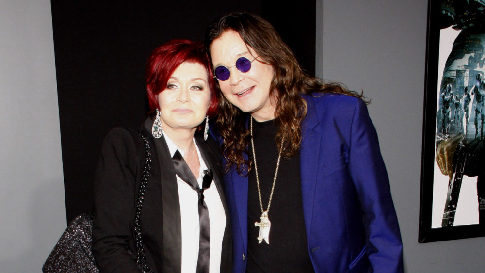 Ozzy Osbourne, 73, supported by wife Sharon, 69, in performance at