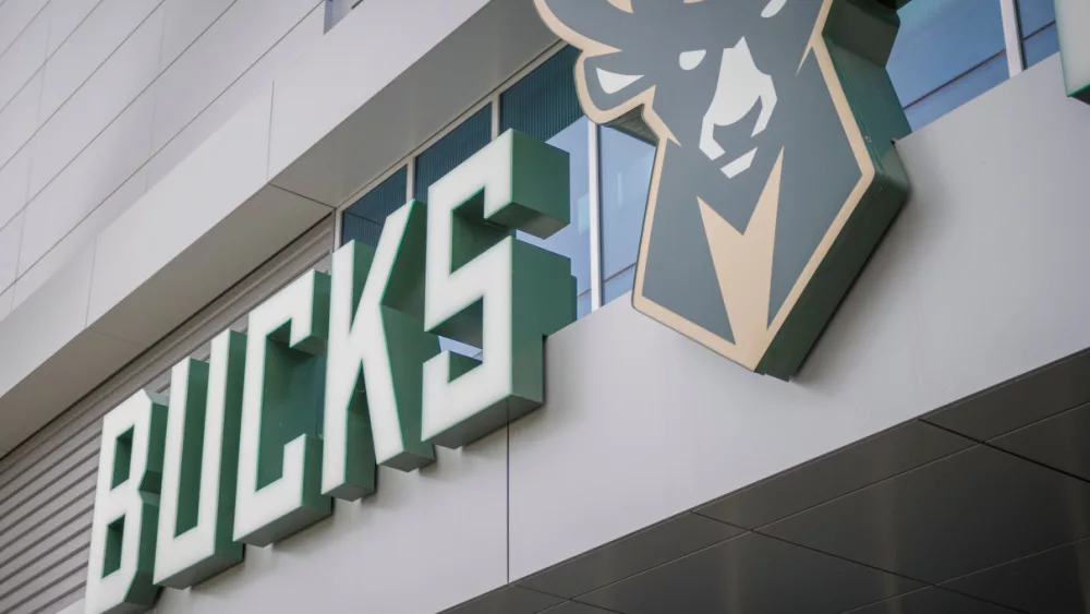 Milwakee Bucks text and logo at NBA Basketball Fiserv Forum arena