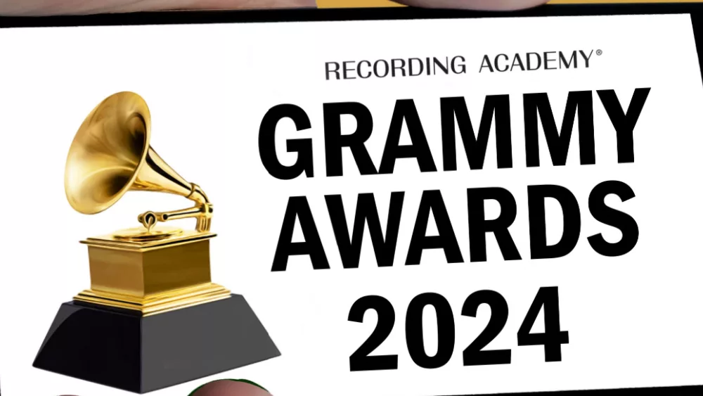 Grammy awards 2024 logo displayed on hand holding mobile screen. isolated on color background.