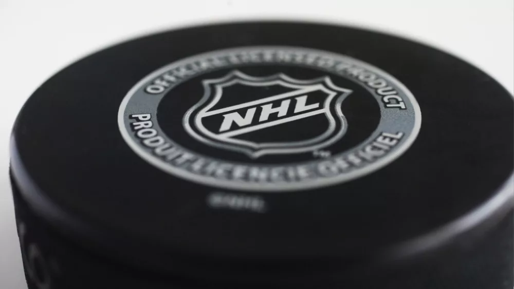 Officiel licensed hockey puck for NHL^ National hockey league.