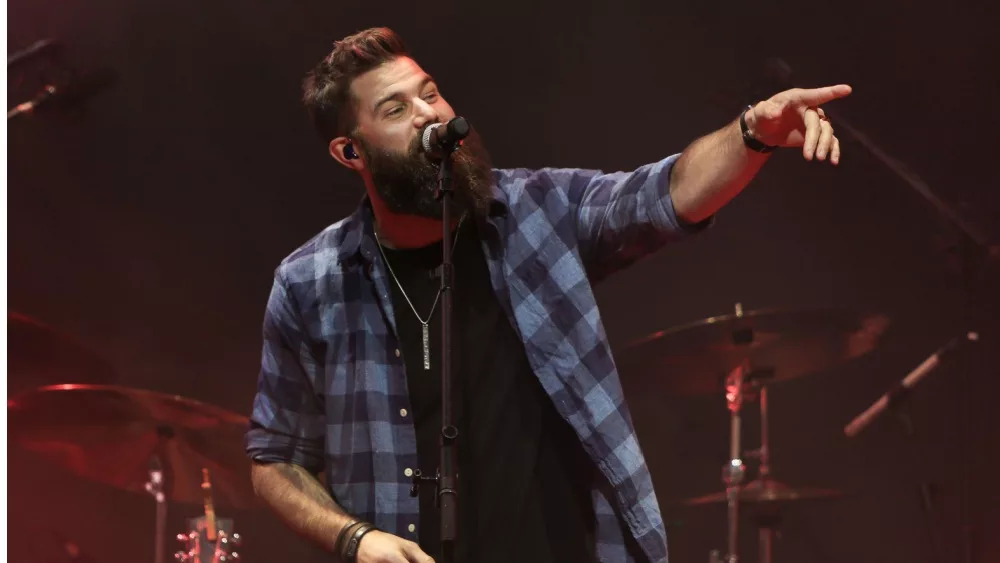 NASHVILLE^ TN - JUN 3: Jordan Davis performs at CMT's RAMJAM on June 3^ 2019 at TopGolf in Nashville^ Tennessee.