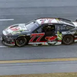 NASCAR: Jack Link: Apr 26, 2026; Talladega, Alabama, USA; NASCAR Cup Series driver Carson Hocevar (77) takes a victory lap after winning the Jack Links 500 NASCAR Cup Series race at Talladega Superspeedway. Mandatory Credit: Vasha Hunt-Imagn Images