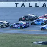NASCAR: Jack Link: Apr 26, 2026; Talladega, Alabama, USA; NASCAR Cup Series driver Carson Hocevar (77) holds off Chris Buescher (17) and Alex Bowman (48) in the final lap to win the Jack Links 500 NASCAR Cup Series race at Talladega Superspeedway. Mandatory Credit: Vasha Hunt-Imagn Images