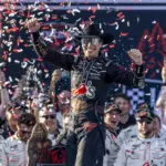NASCAR: Jack Link: Apr 26, 2026; Talladega, Alabama, USA; NASCAR Cup Series driver Carson Hocevar (77) celebrates winning the Jack Links 500 NASCAR Cup Series race in Victory Lane at Talladega Superspeedway. Mandatory Credit: Vasha Hunt-Imagn Images