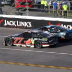 NASCAR: Jack Link: Apr 26, 2026; Talladega, Alabama, USA; NASCAR Cup Series driver Carson Hocevar (77) makes his victory lap after the Jack Links 500 NASCAR Cup Series race at Talladega Superspeedway. Mandatory Credit: David Leong-Imagn Images