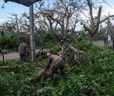 macron-tours-mayotte-cyclone-damage-as-officials-fear-huge-death-toll-2