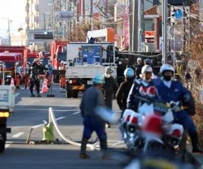 japan-sinkhole-doubles-in-width-as-crews-work-to-free-truck-driver-2