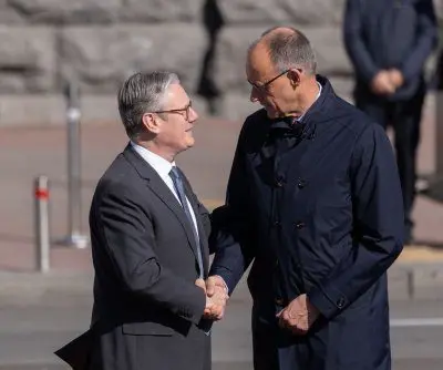 Britain, Germany sign defense, migration treaty