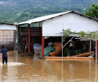 2-likely-dead-many-missing-after-record-rain-floods-southern-japan-2