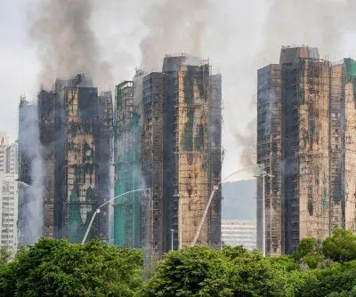 13-people-under-arrest-on-suspicion-of-manslaughter-in-hong-kong-fire-2