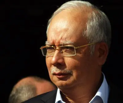former-malaysian-pm-gets-15-years-for-money-laundering-abuse-of-power