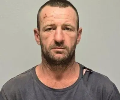 australian-police-launch-large-scale-search-for-gunman-who-killed-three