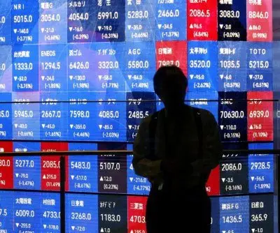 Japan’s Nikkei briefly tops 60,000 for first time