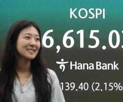 Seoul stocks close at a new record high amid AI-led tech rally