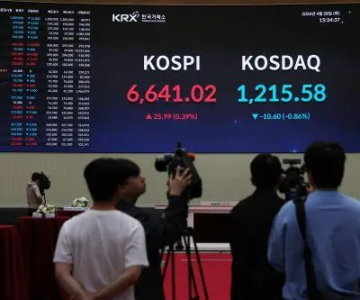 Seoul stocks again at fresh peak ahead of U.S. big tech earnings