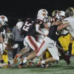 fb-chs-ahs098-25-10-24: Carroll High wins a Class 3A district title with a 35-7 win over Atlantic in a battle of 3-0 teams (in district play) at Carroll Athletic Field on Friday, October 24, 2025.