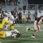 fb-chs-ahs106-25-10-24: Carroll High wins a Class 3A district title with a 35-7 win over Atlantic in a battle of 3-0 teams (in district play) at Carroll Athletic Field on Friday, October 24, 2025.