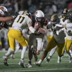 fb-chs-ahs108-25-10-24: Carroll High wins a Class 3A district title with a 35-7 win over Atlantic in a battle of 3-0 teams (in district play) at Carroll Athletic Field on Friday, October 24, 2025.