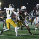 fb-chs-ahs113-25-10-24: Carroll High wins a Class 3A district title with a 35-7 win over Atlantic in a battle of 3-0 teams (in district play) at Carroll Athletic Field on Friday, October 24, 2025.