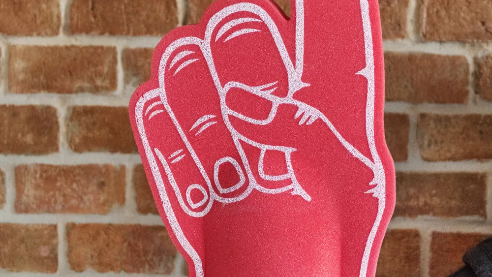 man-with-sport-number-1-fan-glove