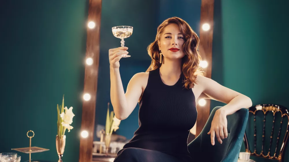 posh-woman-drinking-champagne-in-the-luxury-interi-2022-11-15-17-02-56-utc