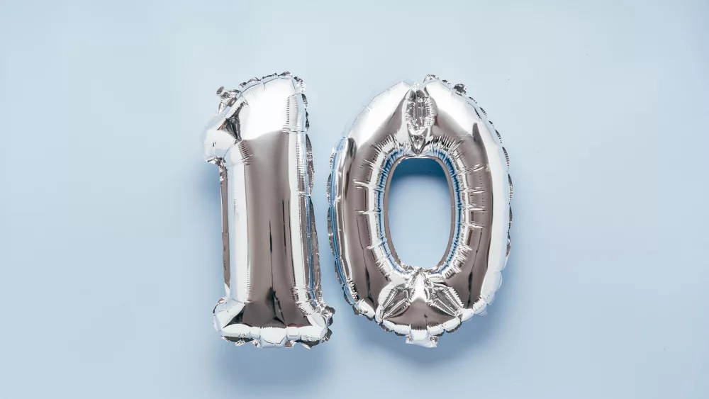 silber-balloon-number-10-on-light-blue-background