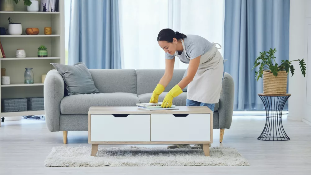 cleaning-is-for-weekends-shot-of-a-young-woman-cleaning-at-home