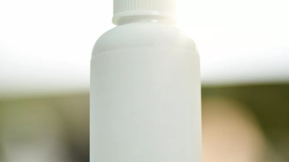 handy-travel-size-bottle-of-sanitizer-on-the-table