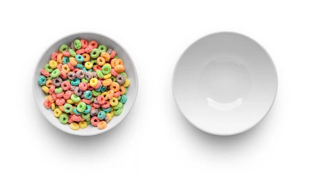 full-with-cereal-bowl-and-empty-bowl-isolated-on-white-background