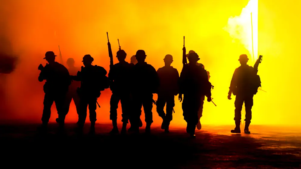 silhouette-army-soldiers-amidst-smoke-at-sunset-2025-01-29-08-24-58-utc