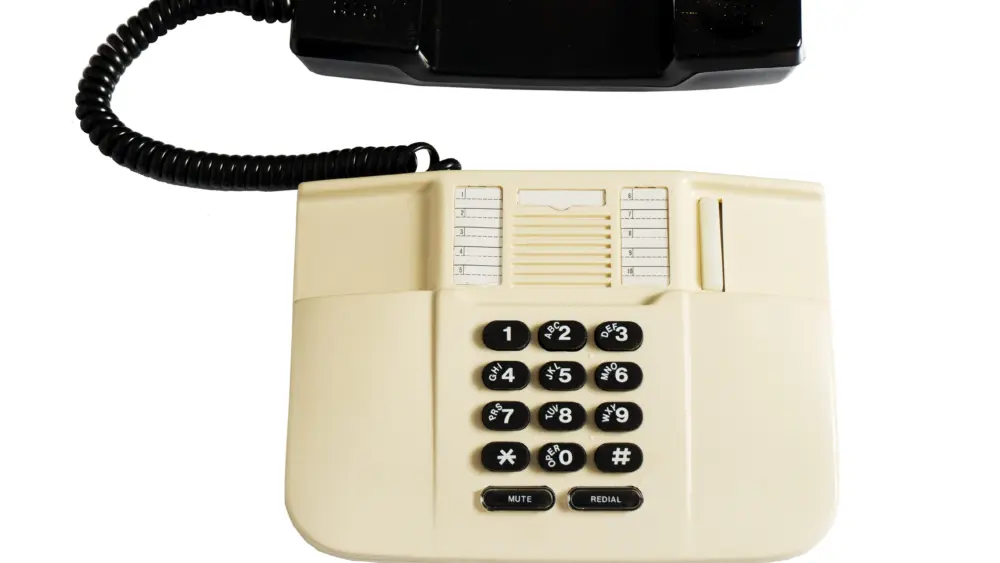 landline-corded-push-button-telephone-isolated-on-white-background